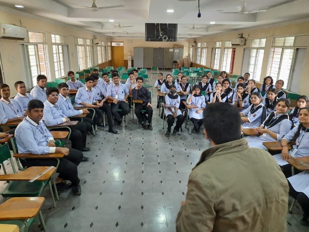 Students assembled in the seminar hall for Lit Club debate, poetry, and creative writing workshop