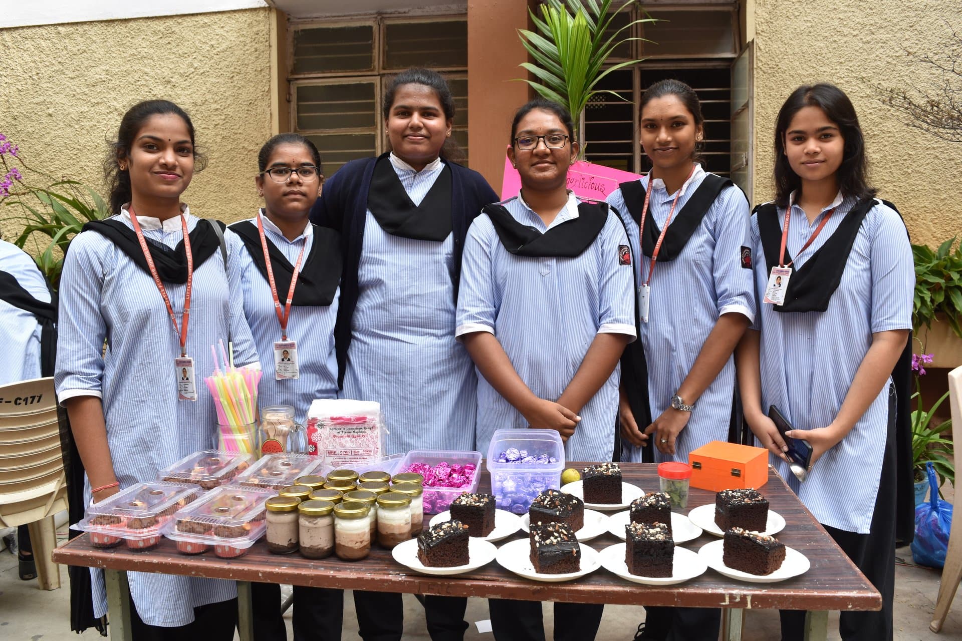 Faculty & Students reviewing Cultural Food Fest Stalls