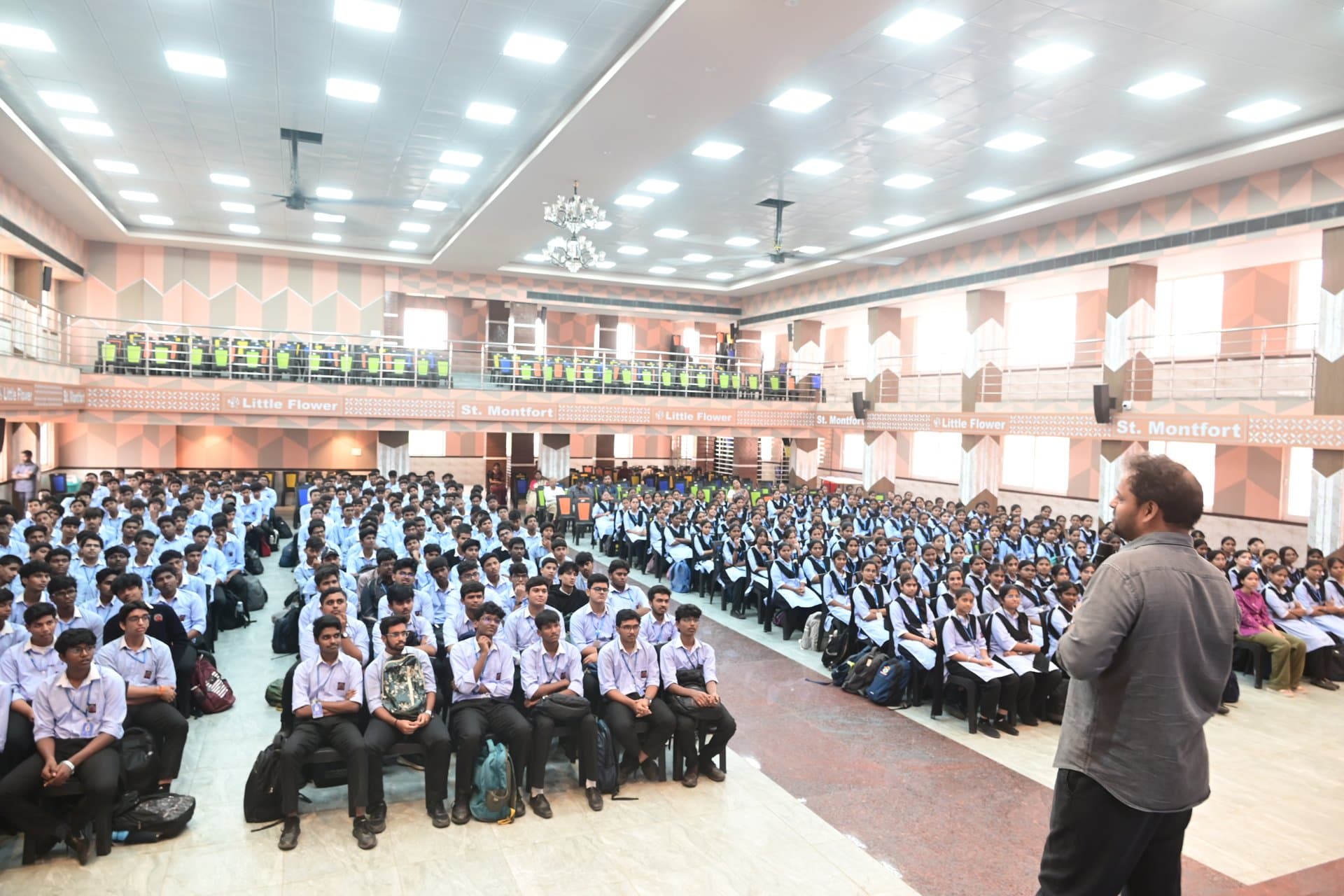 Motivational Keynote Speaker addressing Student Assembly