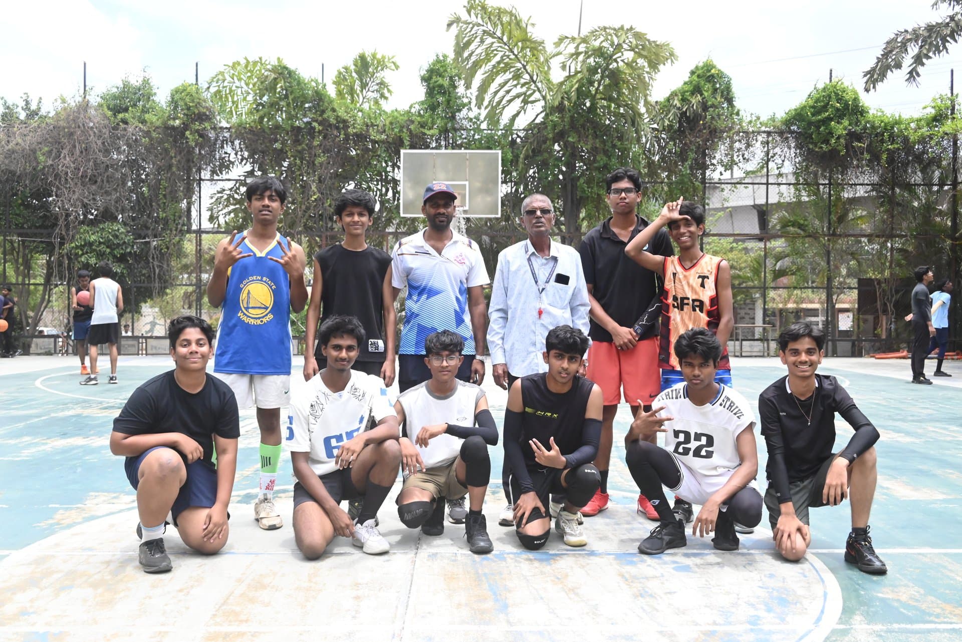Basketball Champions Squad & Faculty Mentors